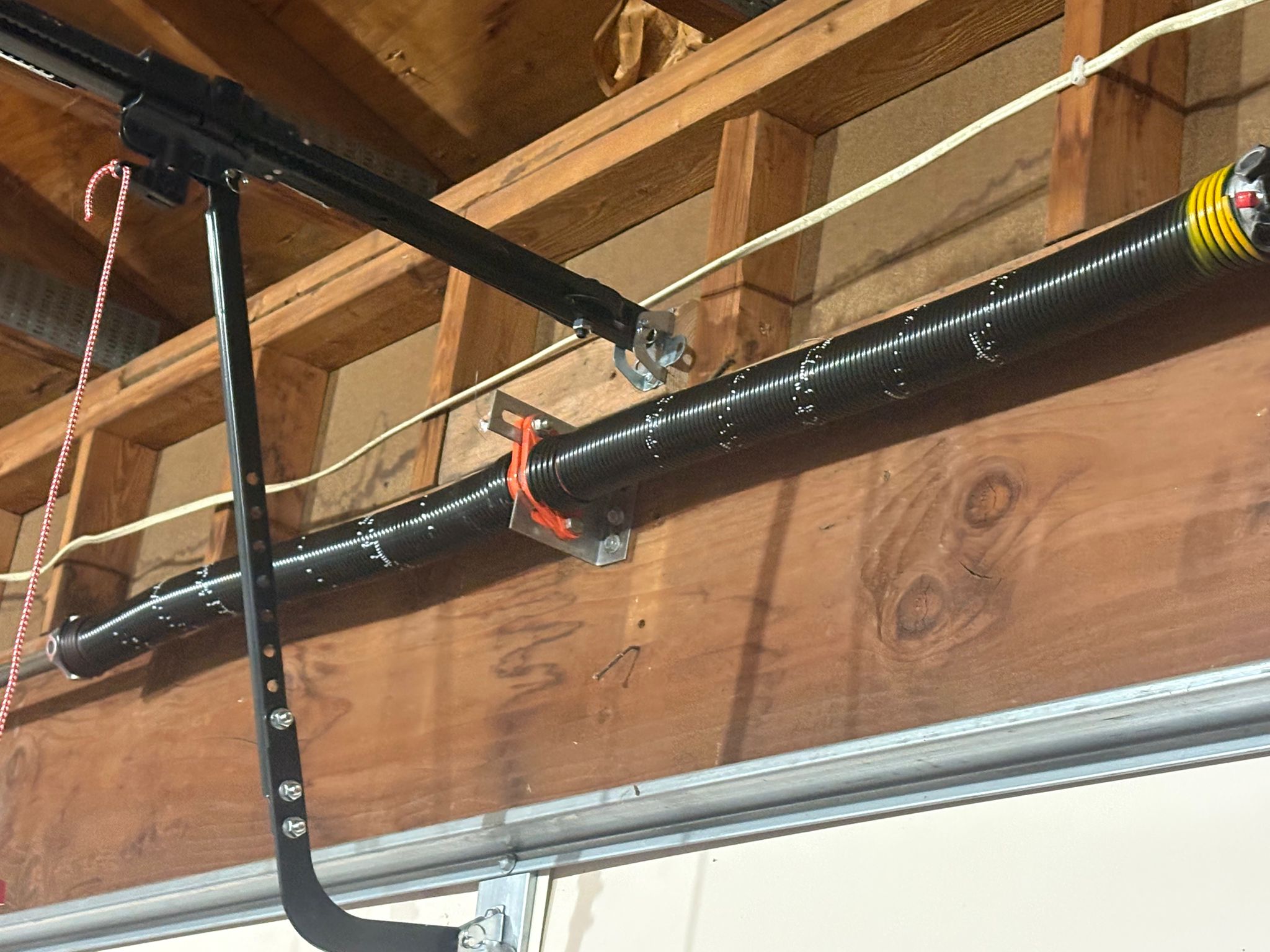 Broken spring replacement on a residential garage door